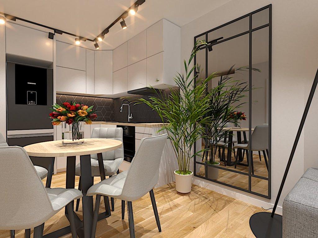 Salon z aneksem kuchennym w mieszkaniu 38m2 widok na kuchnię i jadalnię