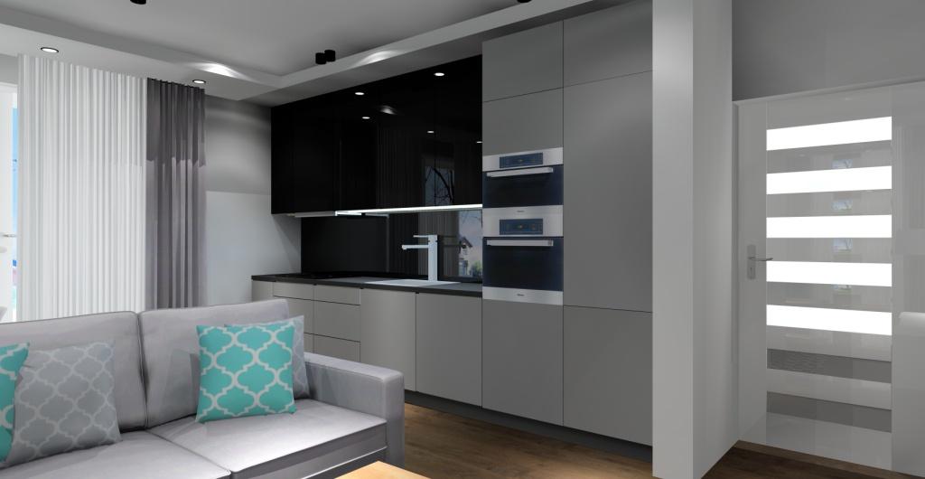 Kuchnia z szarymi frontami dolnymi i górnymi czarnymi