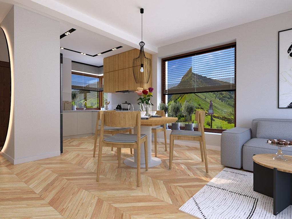 Aranżacja salonu z aneksem kuchennym